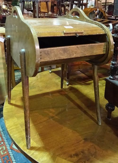A mid-20th century sewing box with tambour roll top, 57cm wide x 57cm high.  D8