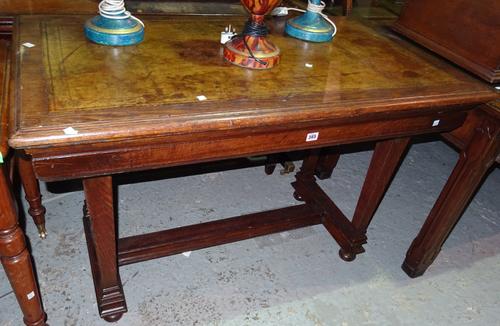 A 19th century Continental oak writing table, with leather inset top, on square tapering supports united by stretcher, 123cm wide x 80cm high.  G3