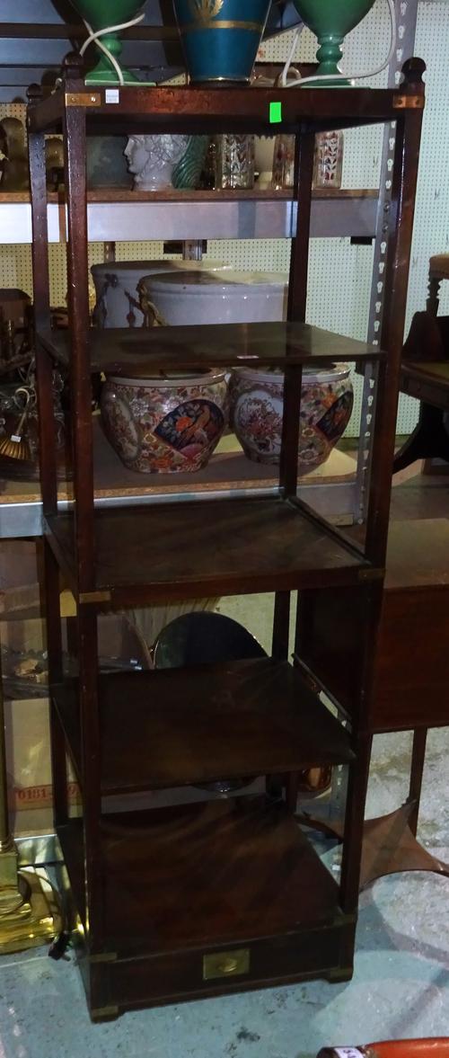 A mahogany campaign style five tier what-not, on a single drawer base, 53cm wide x 168cm high.  I3