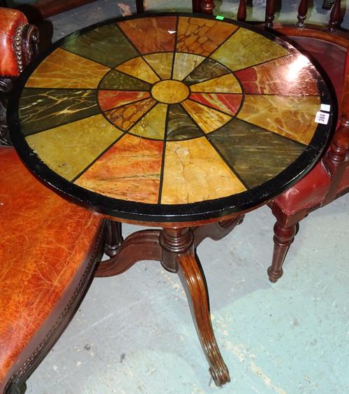 A 19th century walnut circular tripod table, with faux painted specimen marble top, on cabriole supports, 61cm wide x 73cm high.  E4
