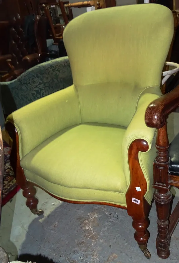 A 19th century mahogany framed button back armchair.  H3