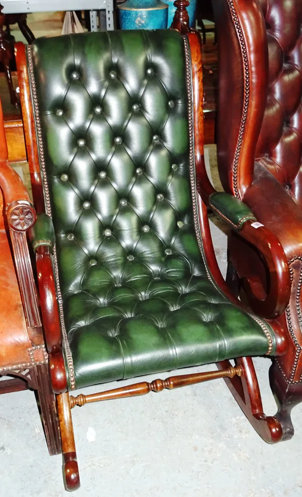 A Victorian style mahogany green button upholstered rocking chair.  H4