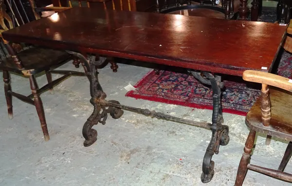 A cast iron rectangular table base with later mahogany top, 86cm wide.  E4