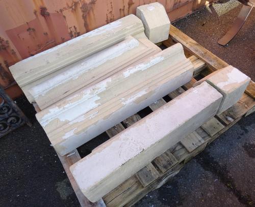 An early 20th century reconstituted stone fire surround.   OUT