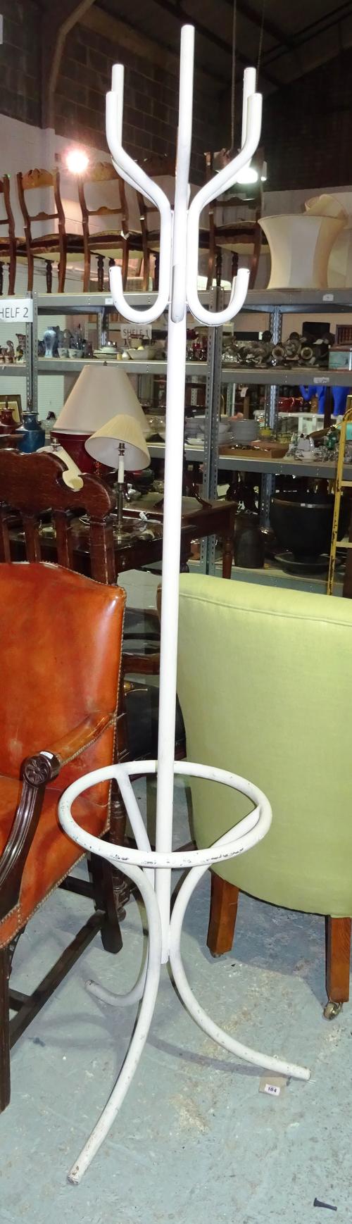 An early 20th century white painted metal coat stand.  I3
