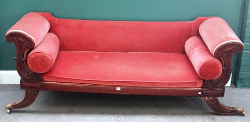 A George IV mahogany framed sofa, with stylised cornucopia arms and out splayed supports, 210 cm wide x 60cm deep x 77cm high.  F5