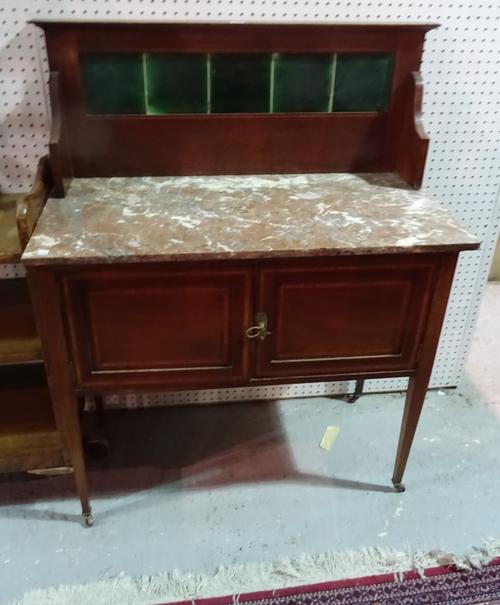 An Edwardian mahogany inlaid washstand with a galleried marble top, 92cm wide x 116cm high.  G9