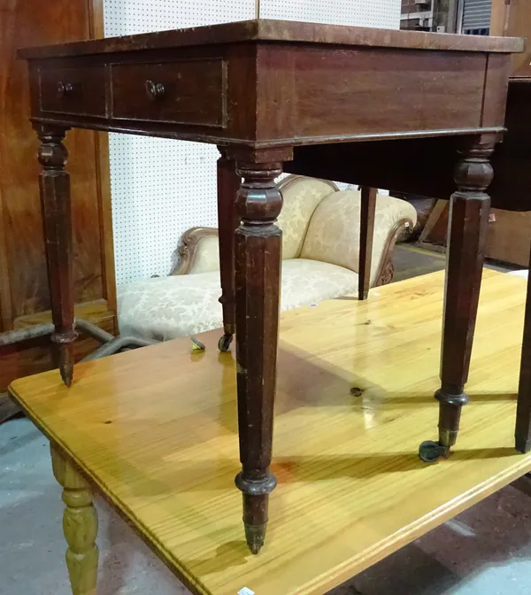 A 19th century mahogany writing desk with two short drawers on octagonal turned supports, 81cm wide x 78cm high.  M8