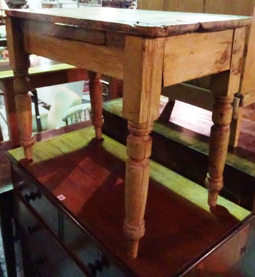 An early 20th century pine single drawer side table on tapering supports, 91cm wide x 71cm high.  J7