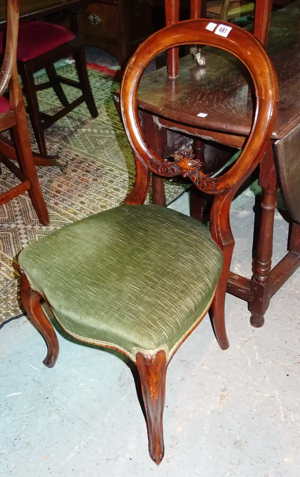 A pair of Victorian walnut balloon back dining chairs, (2).  I6