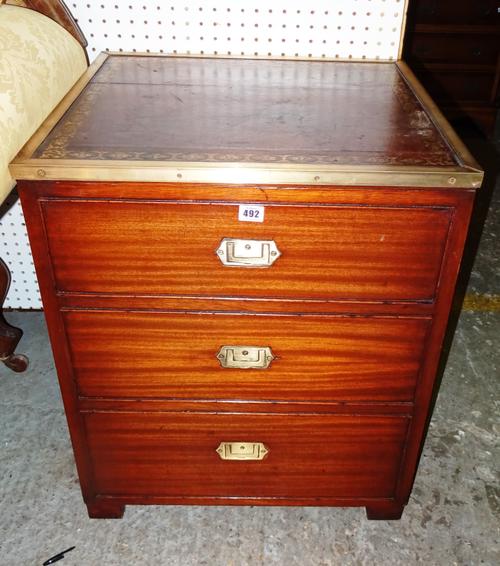 A 20th century mahogany campaign style cupboard with green leather inset top and faux drawer door, 58cm wide x 69cm high.  M5