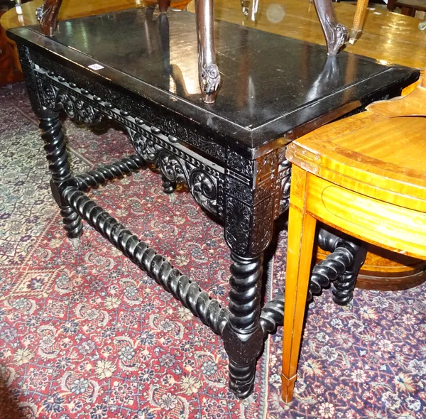 A William and Mary style ebonised centre table, on barleytwist supports and stretchers, 94cm wide x 87cm high.  G7