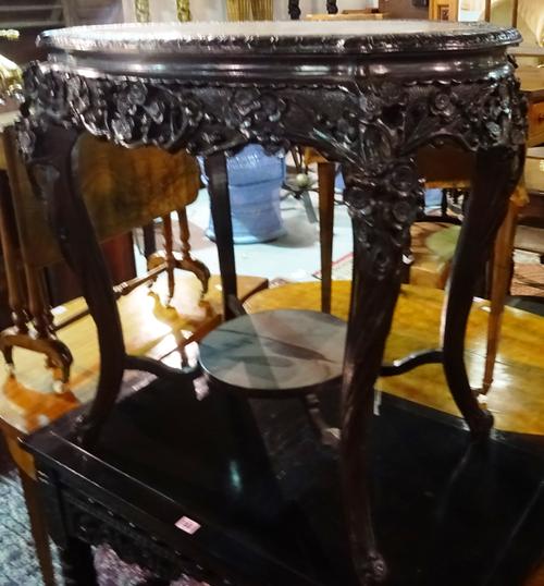 A 20th century Chinese Chippendale oval centre table, on outswept supports united by platform undertier, 78cm wide x 76cm high.  G7