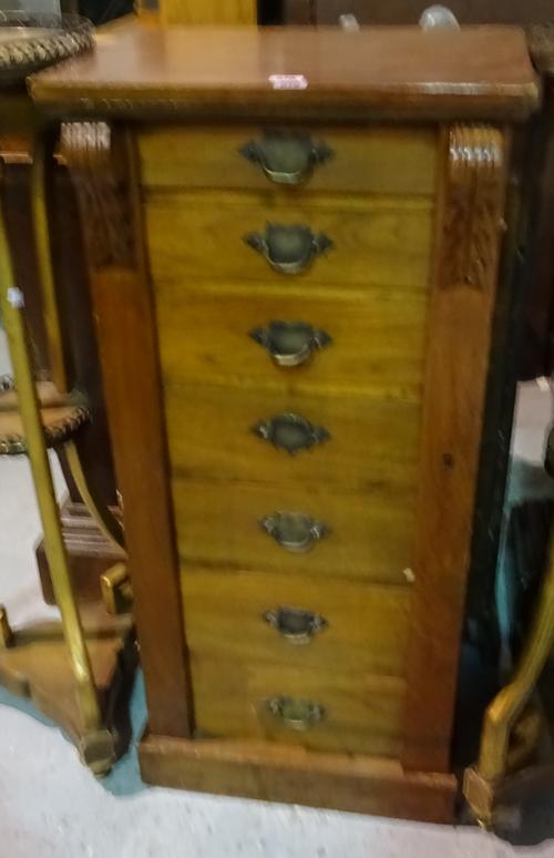 A 19th century mahogany Wellington chest with seven drawers on plinth base, 48cm wide x 105cm high.  J8
