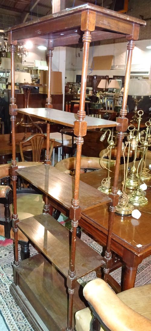 A pair of George III style mahogany five tier what-nots, each with single drawer base, 69cm wide x 177cm high.  I7