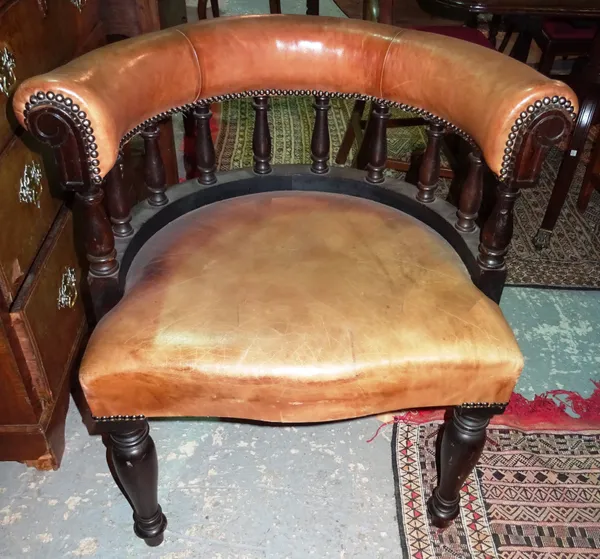 A set of six Victorian tub back armchairs with tan leather upholstery on turned supports, (6).  I7