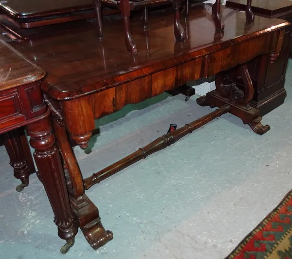 An 18th century rosewood rectangular side table with pair of frieze drawers and lyre shape trestle supports united by stretcher, 126cm wide x 70cm tal