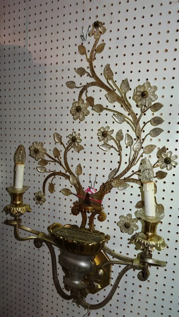A modern gilt and silvered metal two branch wall applique, cast with a central frosted and gilt foliate metal urn, issuing foliate branches, decorated