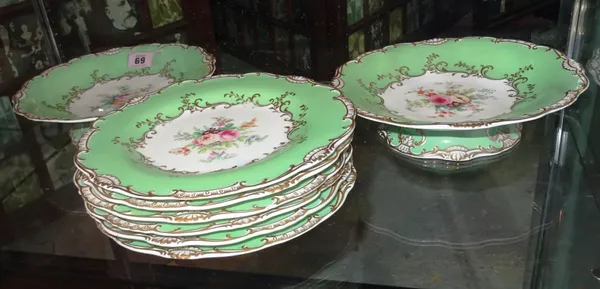 A set of eight Staffordshire fruit plates, decorated with flowers and gilt borders, (8).