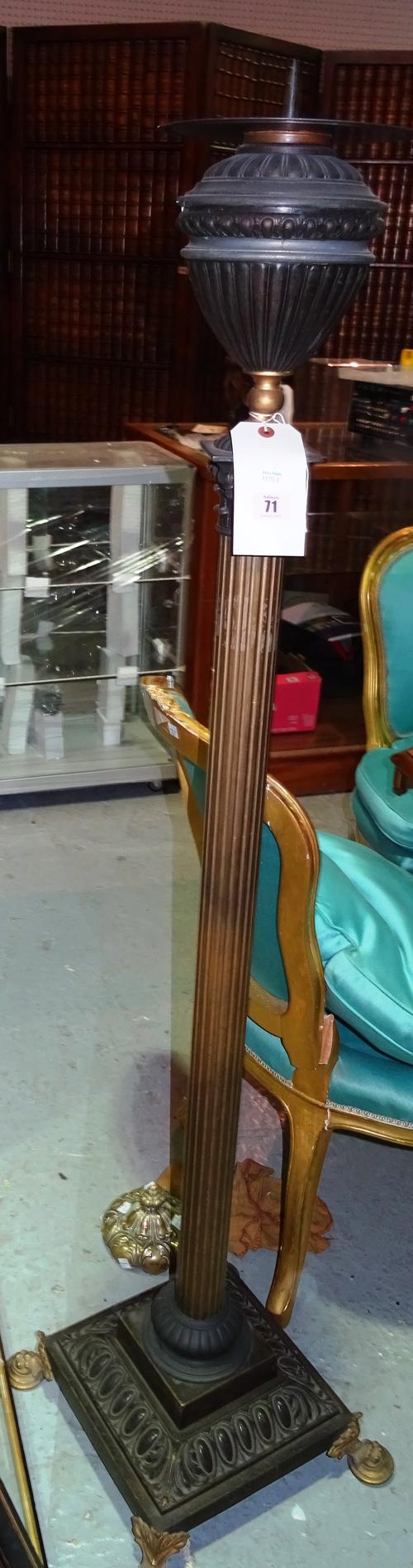 A Regency style patinated bronze and brass oil lamp standard base, of Corinthian column form, on a square plinth and four shaped feet, 147cm high.  D3