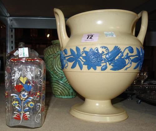 Ceramics and glass comprising; a Regency white pottery jug moulded with a face, with later inscription to base, Wedgwood cream and blue urn, a Persian