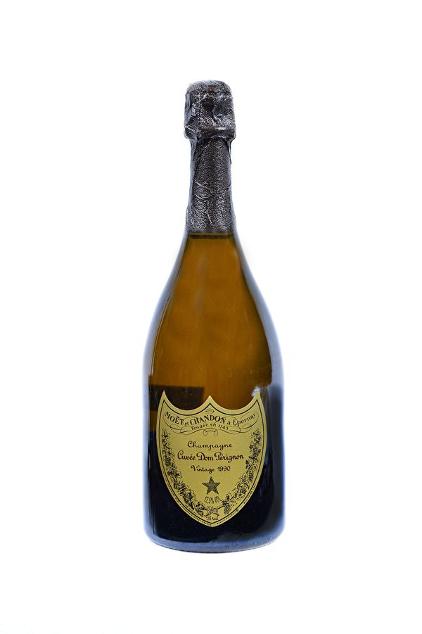 One bottle of 1990 Dom Perignon vintage champagne, boxed.  Illustrated