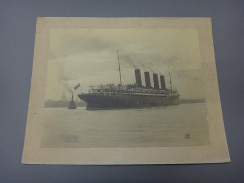 RMS. LUSITANIA - mounted photograph of the vessel. 19 x 25cms., pencilled on lower part of image 'RMS. "Lusitania". / maiden Voyage. /Sept 7 1907'; sh