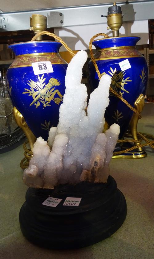A pair of 20th century blue and gilt decorated Empire style table lamps and a mineral stalagmite sample on ebonised base, (3).  S3