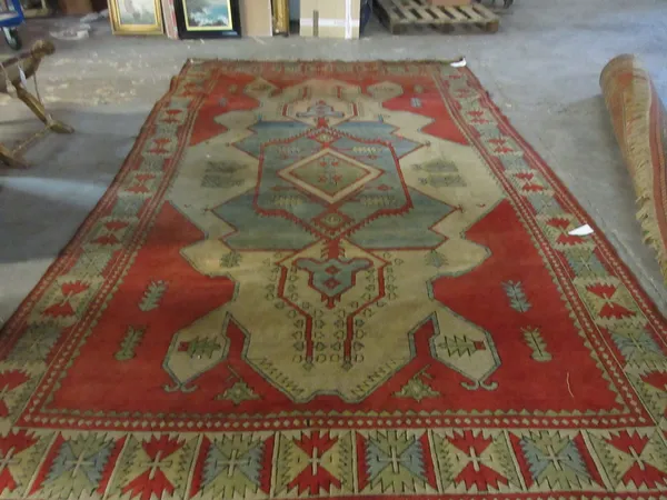 A Turkish carpet, 340cm x 218cm.