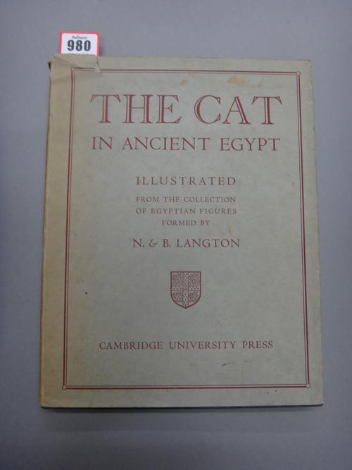 LANGTON (N. & B.)  The Cat in Ancient Egypt  . . .  First Edition. 20 photo. plates, silver-gilt pictorial cloth & d/wrapper, sm. 4to. Camb. Univ. Pre