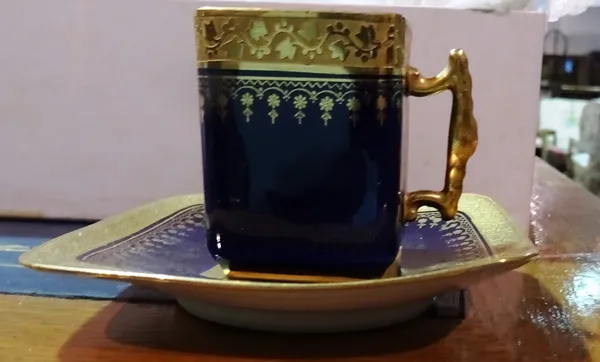 A Sevres six piece blue and gilt coffee set, (6). CAB