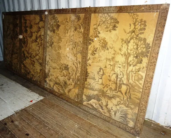 A large machine made tapestry depicting a hunting scene, 460cm long x 160cm high.   LOADING BAY