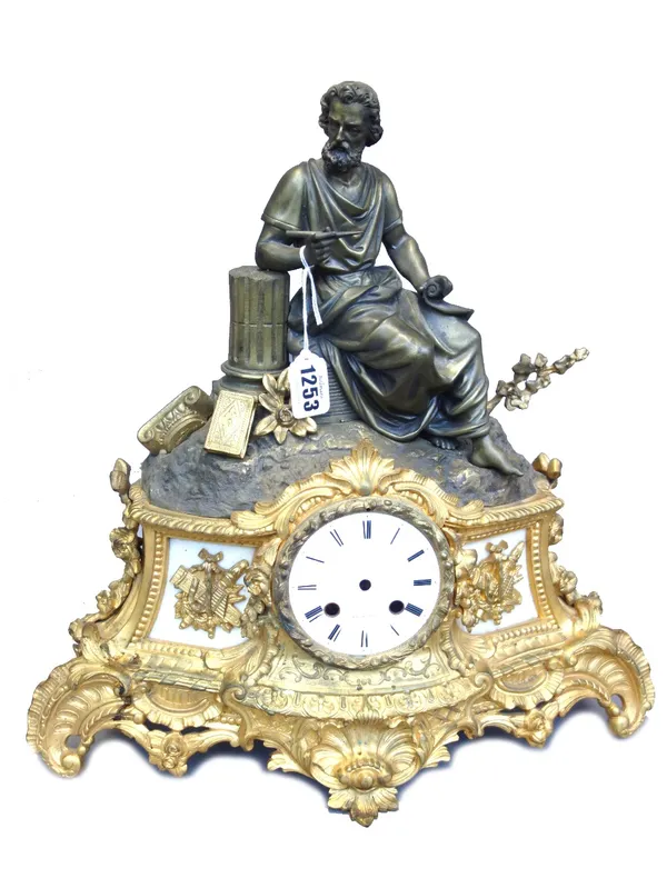 A French figural bronze, gilt metal and marble mounted mantel clock, 19th century, the classical male figure on a rocky base, over an ornate gilt meta