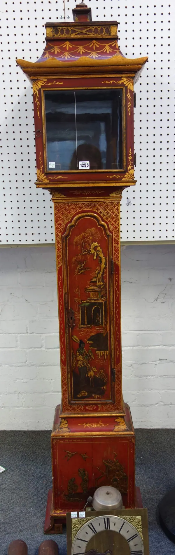 A crimson lacquer chinoiserie decorated longcase clock of small proportions, 20th century, with pagoda shaped rectangular hood, enclosing a two train