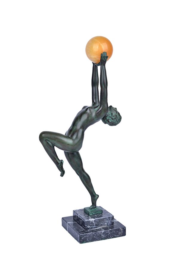 Max Le Verrier (French 1891-1973), an Art Deco patinated spelter figural sculpture depicting a female nude dancer, standing with arms outstretched, ho