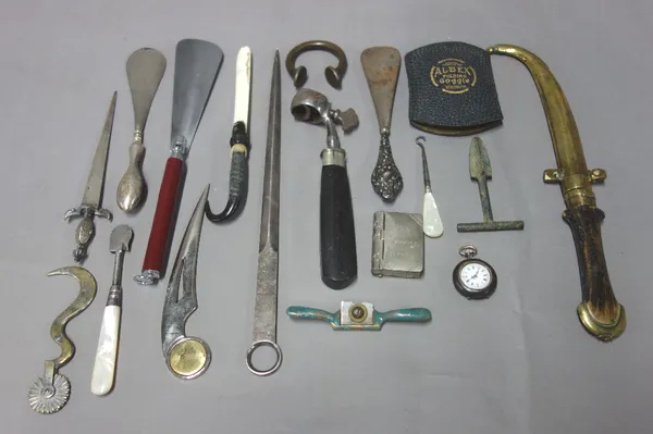 A quantity of small collectables including; a 19th century quill cutter, a ham bone clamp, an African letter opener, a silver plated letter opener, a