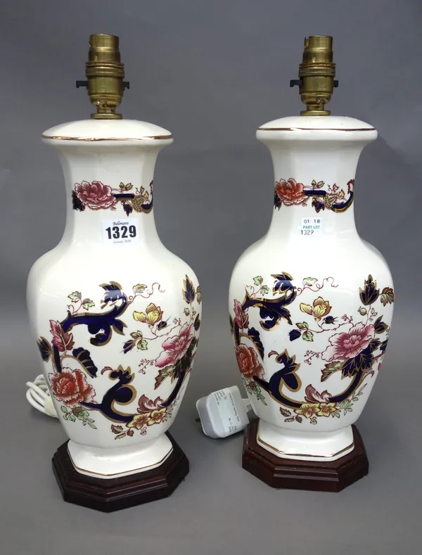 A pair of modern Mason's 'Mandolay' pattern pottery table lamps of octagonal baluster form (31cm high) and a pair of lather bound table lamps, the bas