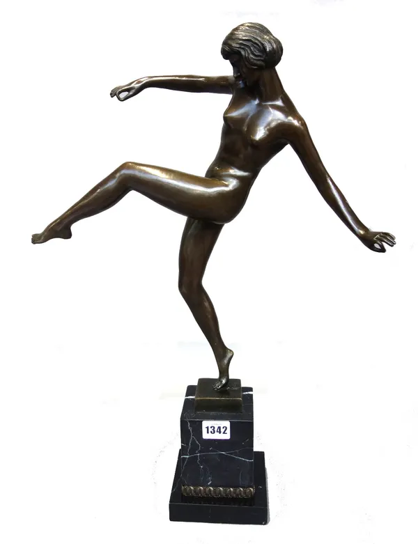 A modern bronze female nude dancer, Art Nouveau style, indistinctly signed on a tall square marble plinth. 54.5cm high.