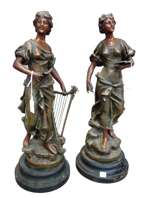 A pair of French spelter figures, emblematic of the Arts (48cm high) and an Austrian cold painted bronze model of a kookaburra, later mounted, (bronze