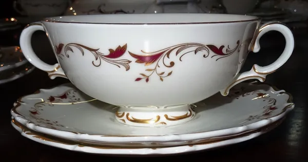 A Royal Doulton Strasbourg part dinner service, with pink and gilt floral decoration, (qty).  G7