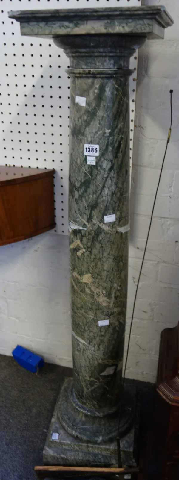 A Victorian green marble pedestal column, late 19th century with square top and base united by a shaped cylindrical column, 178cm high.