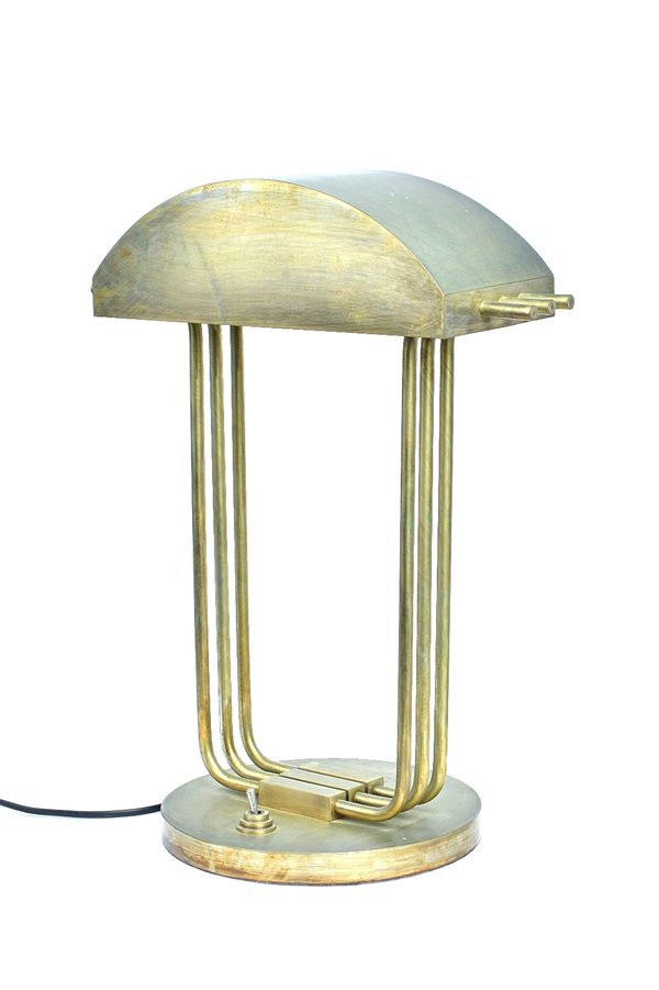 Marcel Breuer; a silvered brass lamp for the 1925 Paris Exhibition, rubbed, with circular mark, 47.3cm high.  Illustrated