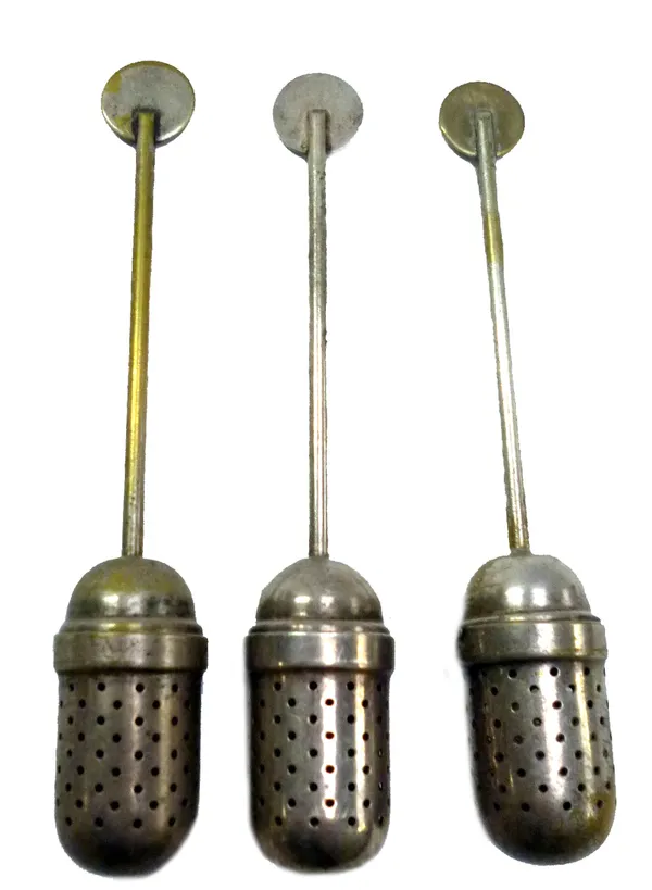 Bauhaus Design, Christian Dell; three silver plated tea infusers, circa 1924-1929, the largest 13cm long, (3).