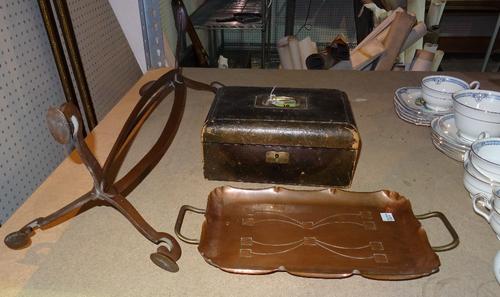 A bronze stand of Art Nouveau design, a late 19th century Austrian copper tray, and a late 19th century leather jewellery box, (3). S1