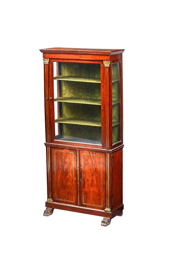 A Regency style diminutive brass inlaid mahogany display cabinet, the single glazed door over a pair of cupboards, on lions paw feet, 46cm wide x 99cm
