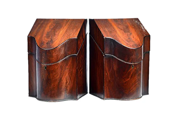 A pair of George III inlaid mahogany slope top knife boxes, each with serpentine front and fitted interior, 23cm wide x 34cm high x 22cm deep, (2).  I