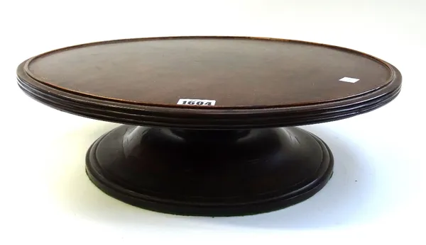A 19th century mahogany circular lazy Susan, on stepped base, 46cm diameter x 14cm high, together with an early 19th century mahogany serving tray wit
