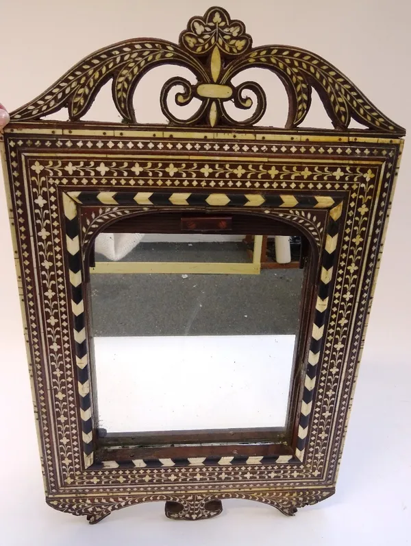 A 19th century bone inlaid Anglo-Indian hardwood wall mirror, with pull-down tambour panel, 31cm wide x 50cm high.