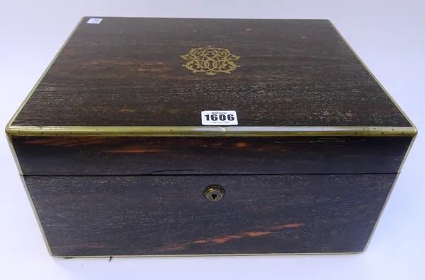 An early Victorian brass bound coromandel dressing box, with fitted interior and Bramah lock, 36cm wide x 18cm high x 28m deep.