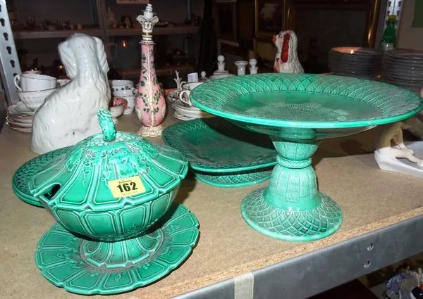 Ceramics, comprising; a Minton green glazed compote, a similar green glazed platter, two dinner plates and an associated lidded tureen and cover (a.f)